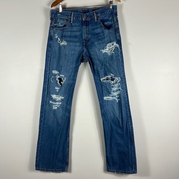 Levi’s 569 Medium Wash Distressed Boot Cut Jeans - Picture 1 of 5